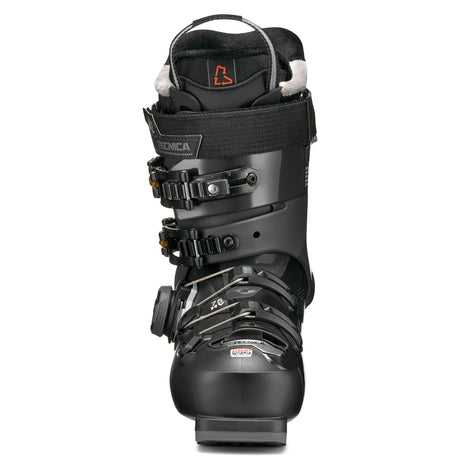 MACHBOAHV75-Black Tecnica ski boot with gold accents on a white background