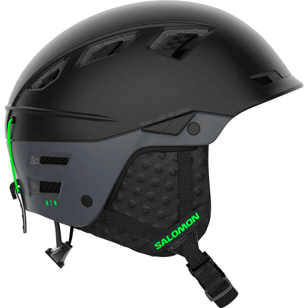 MTN Lab- Black helmet with green accents and 'Salomon' branding on a white background