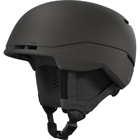 FourAmidLite- A black Atomic ski helmet with a red visor and gold accents on the strap.