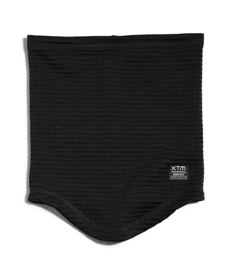 AerogridNeckWarmer-A black ribbed knit neck gaiter or balaclava with a small white XTM logo on the lower right, displayed flat against a white background.