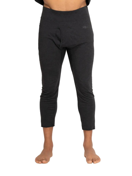 ArmadaHooplerBaselayerBottomMens- Man wearing a black baselayer pant on a white background