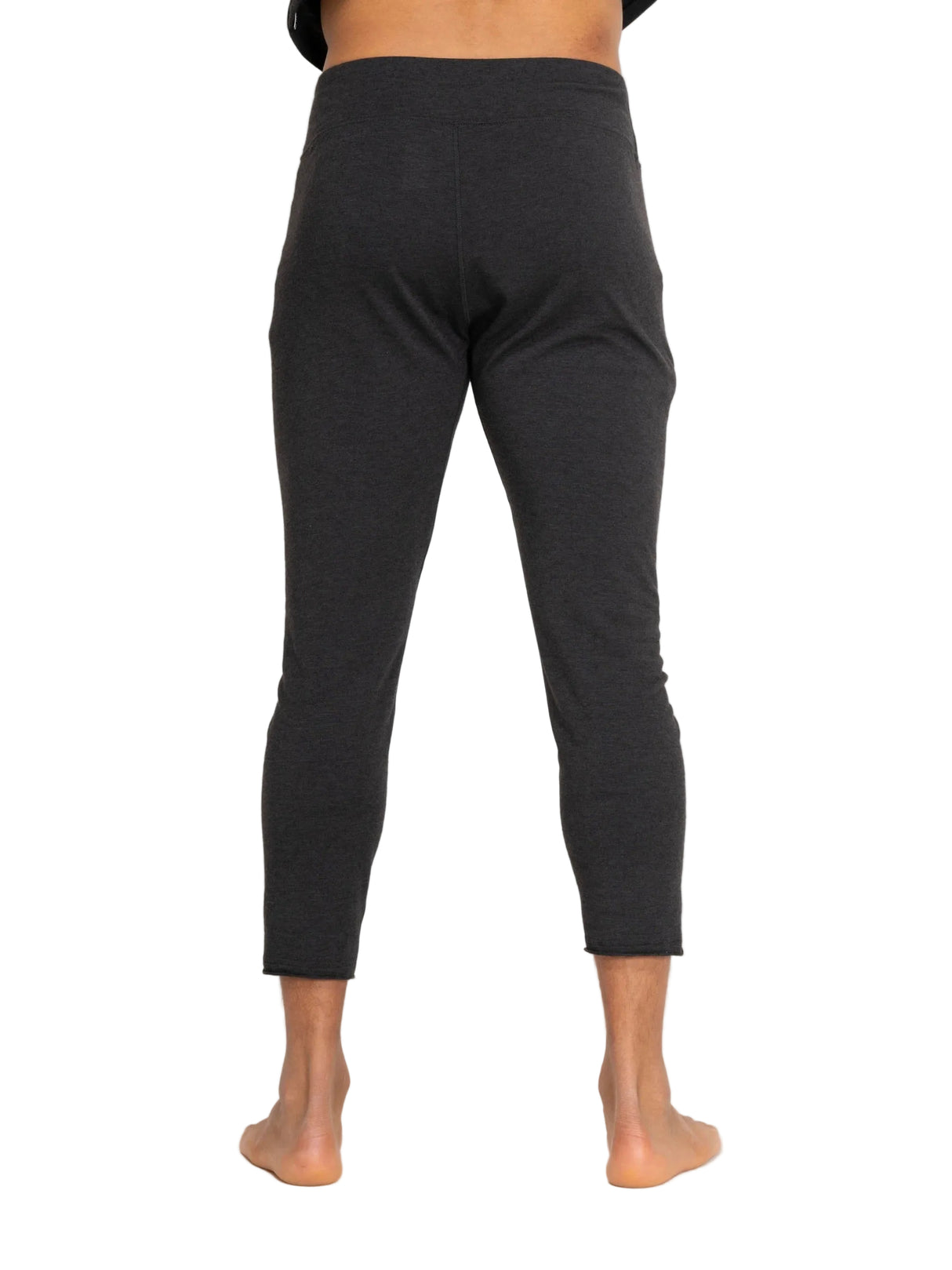 ArmadaHooplerBaselayerBottomMens- Man wearing a black baselayer pant on a white background