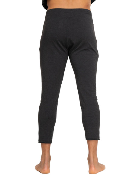 ArmadaHooplerBaselayerBottomMens- Man wearing a black baselayer pant on a white background