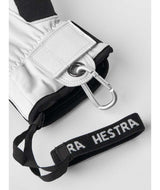 ArmyLeatherPatrol-Pair of black and white gloves with a logo on a white background