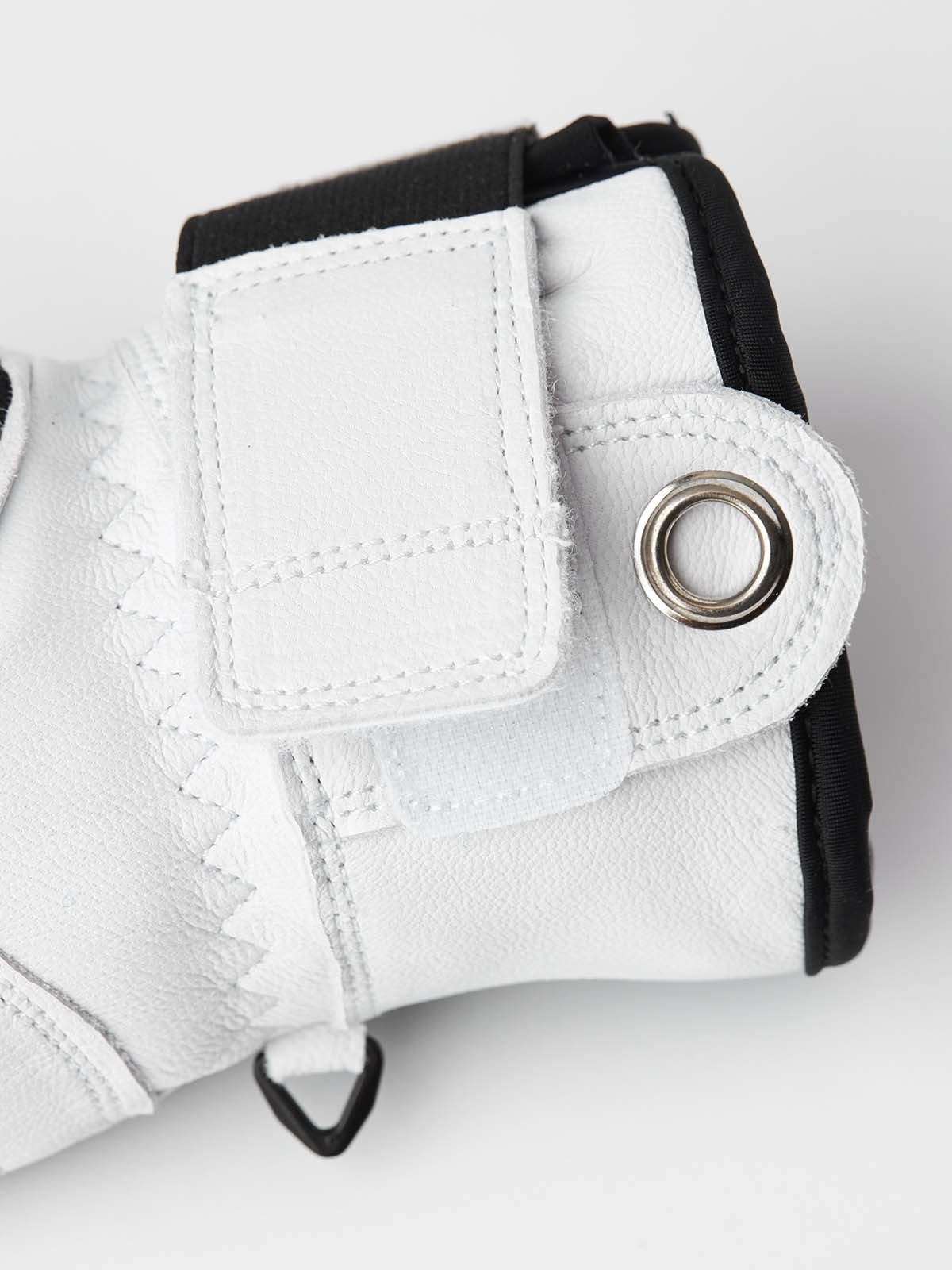 ArmyLeatherPatrolMitt-Pair of white and black mittens with a visible brand logo on a white background
