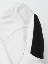 ArmyLeatherPatrolMitt-Pair of white and black mittens with a visible brand logo on a white background