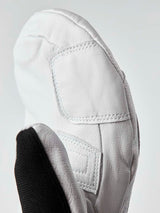 ArmyLeatherPatrolMitt-Pair of white and black mittens with a visible brand logo on a white background