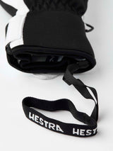 ArmyLeatherPatrolMitt-Pair of white and black mittens with a visible brand logo on a white background