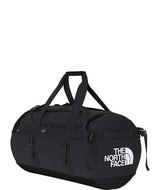 BaseCampDuffel_M-Black duffel bag with The North Face logo on a white background