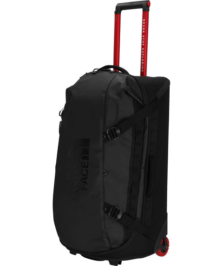 BaseCampRollingThunder_28-Black rolling duffel bag with red wheels on a white background