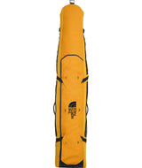 BaseCampSnowRoller-Yellow snowboard bag with The North Face logo on a white background