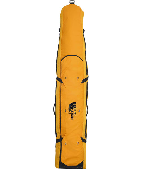 BaseCampSnowRoller-Yellow snowboard bag with The North Face logo on a white background