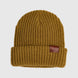 ChunkBeanie-Brown knit beanie with a leather patch on a light gray background