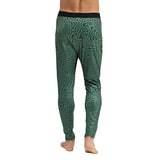 MSkylinerPant-Green patterned leggings worn by a person on a white background