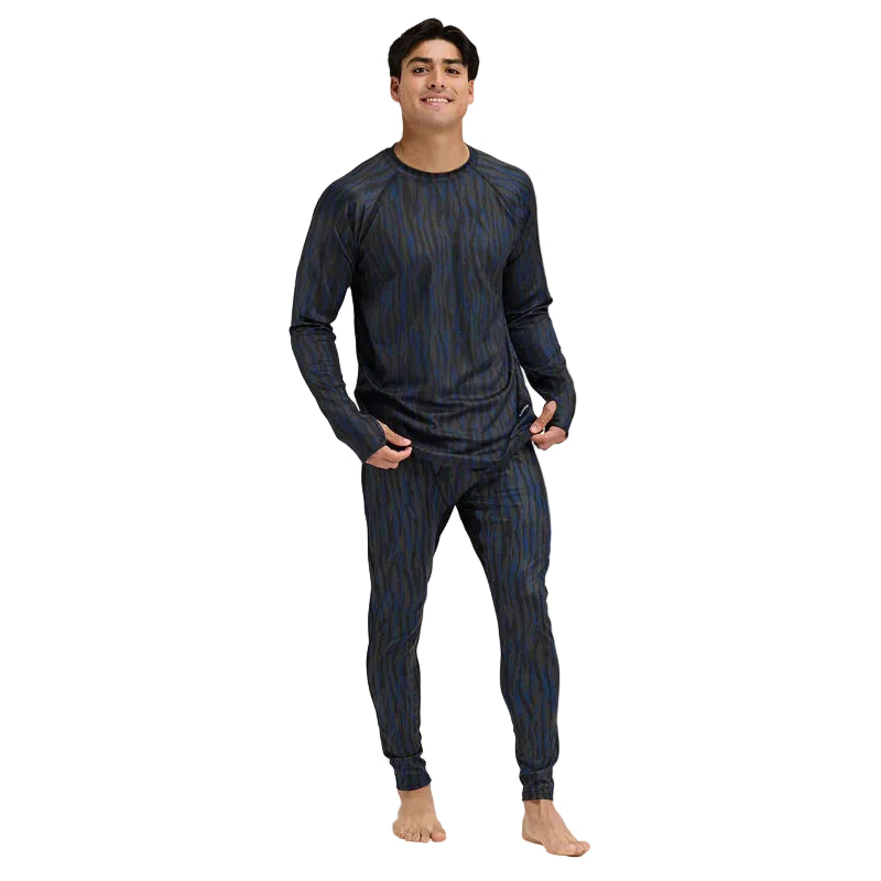 MSummitBaseLayerCrewneck-Man wearing a dark blue baselayer set on a light gray background