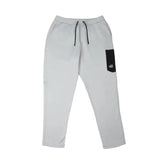 MSpectrumFleecePant-Gray sweatpants with a black patch on a white background