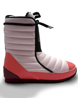 Bootie2- A single boot from the brand LINE, featuring a light pink quilted upper, a coral-pink toe and heel, and a black vertical strap with the brand name printed in coral-red.