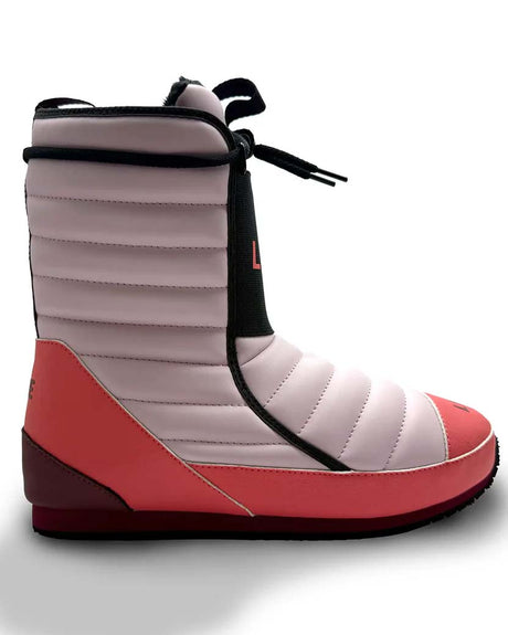 Bootie2- A single boot from the brand LINE, featuring a light pink quilted upper, a coral-pink toe and heel, and a black vertical strap with the brand name printed in coral-red.