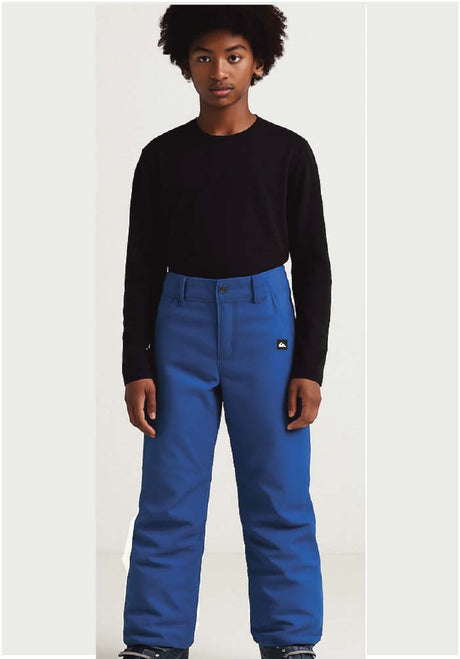 BoysEstatePant- Boy wearing blue snow pants 
