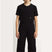 BoysMashUpYouthBib- Boy wearing black snow pants 