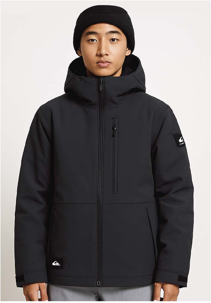 BoysMissionSolidJacket- Boy wearing a black ski jacket 