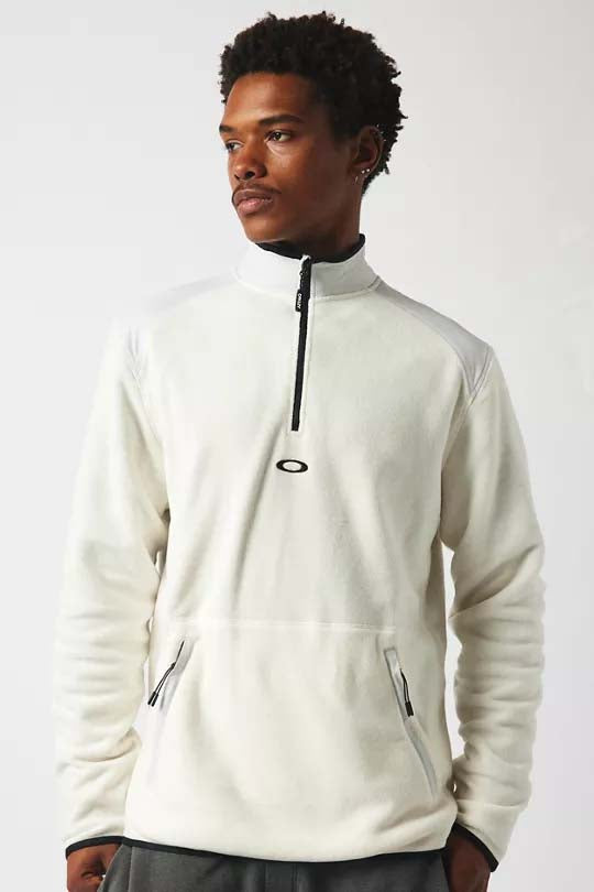 ButterTechFleece-Man wearing a white pullover with a zipper on a white background