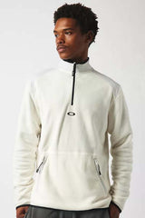 ButterTechFleece-Man wearing a white pullover with a zipper on a white background