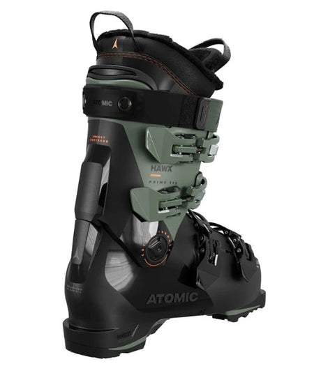 Hawx Prime 110-A single men's Atomic Hawx Prime 110 GW ski boot in black and green color with adjustable buckles and branding on the cuff.