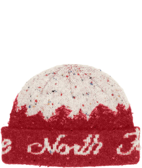 CabinMountainscapeBeanie-Red and white knit beanie with 'The North Face' logo on a white background