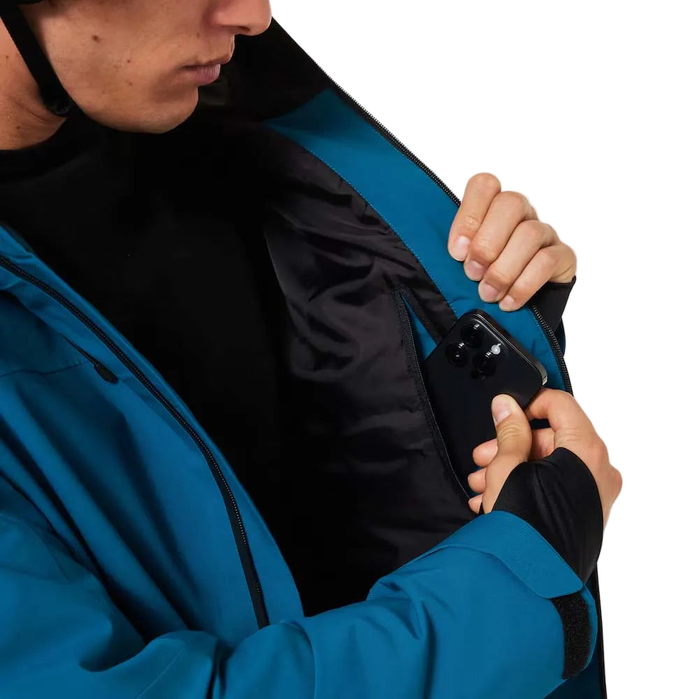 CanopyIns.Jacket- Blue jacket with a patterned pocket on a white background