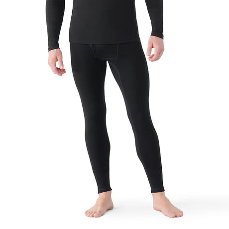 ClassicThermalMerinoBaseLayerBottom-Person wearing black thermal underwear on a white background