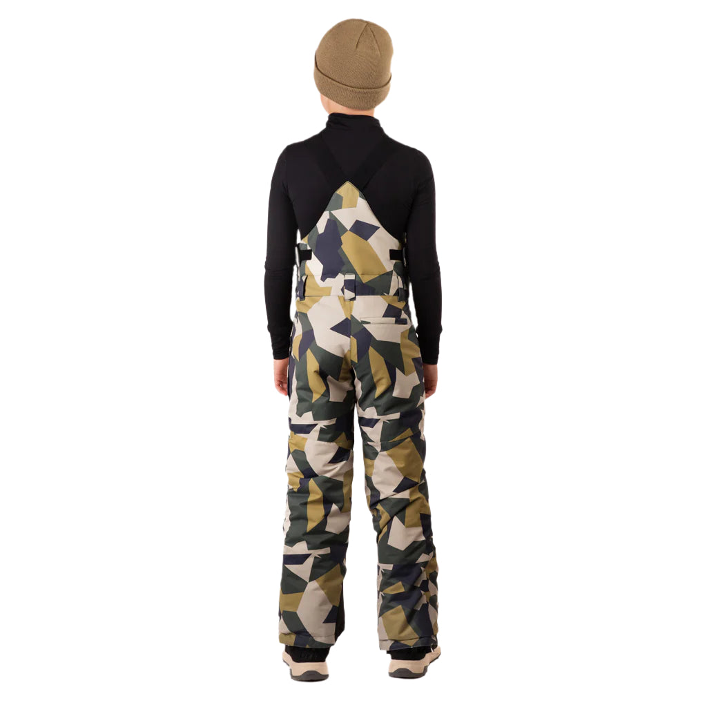 CooperBib-Child wearing camouflage bib overalls on a white background