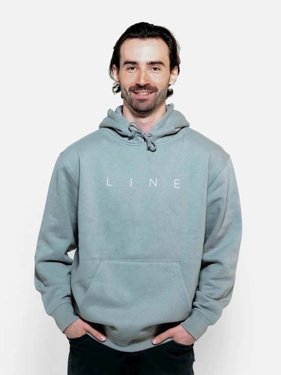 CorpoHoodie-Man wearing a light blue hoodie with 'LINE' branding on a white background