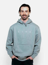 CorpoHoodie-Man wearing a light blue hoodie with 'LINE' branding on a white background