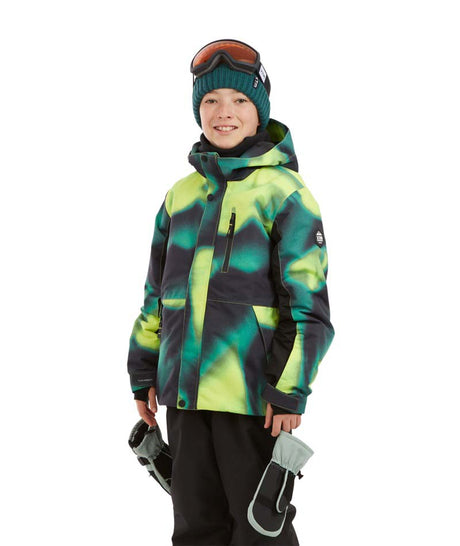CosmicJacket-A child wearing a vibrant neon green and black patterned ski jacket, a dark green beanie with ski goggles on top, and black snow pants, holding gloves against a plain white background.