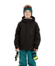 CosmicJacket-A child wearing a black snowboard jacket, teal snow pants, a teal knit beanie with ski goggles on top, and holding black and neon yellow gloves, photographed against a plain white background.