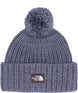 CozyChunkyCabinBeanie-Purple knit beanie with pom-pom and The North Face logo on a white background