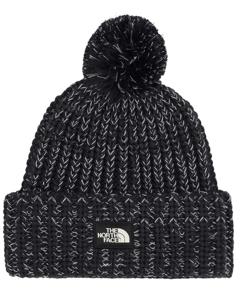 CozyChunkyCabinBeanie-Black knit beanie with pom-pom and The North Face logo on a white background