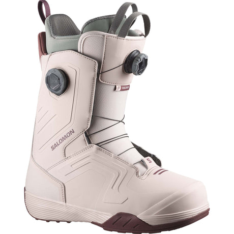 Dialogue- Cream snowboard boot with maroon accents shown on a white background 