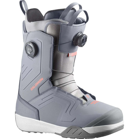DialogueDualBOATeam- A Salomon snowboard boot in gray and black with a dial closure system and a small orange Salomon logo, shown against a plain white background.