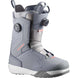 DialogueDualBOATeam- A Salomon snowboard boot in gray and black with a dial closure system and a small orange Salomon logo, shown against a plain white background.
