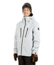 ExposureJacket-A man wearing a light gray ski jacket with black zippers, a dark beanie with goggles, and brown gloves, standing against a plain white background.