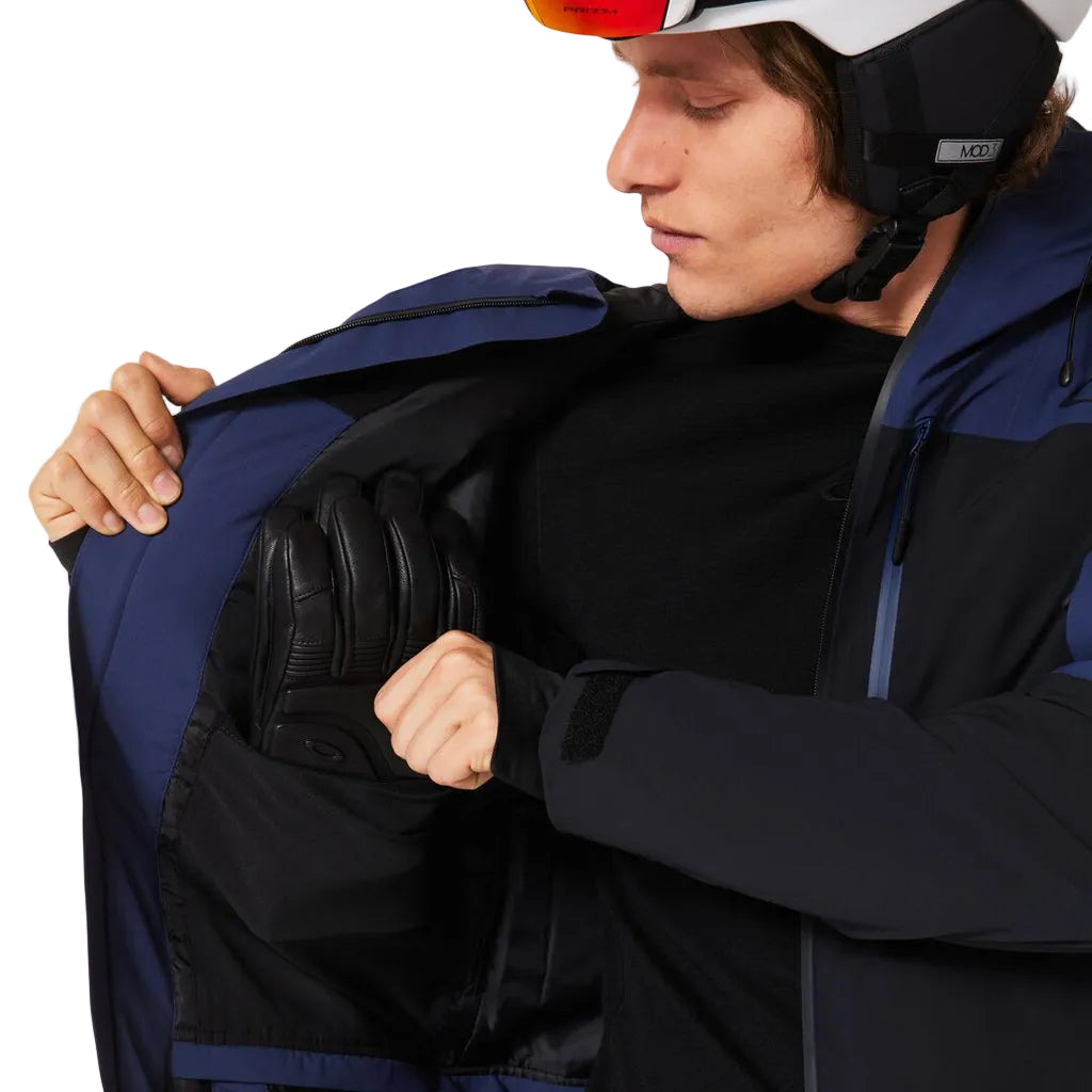 CanopyIns.ProJacket-Blue and black jacket with a brand logo on a white background