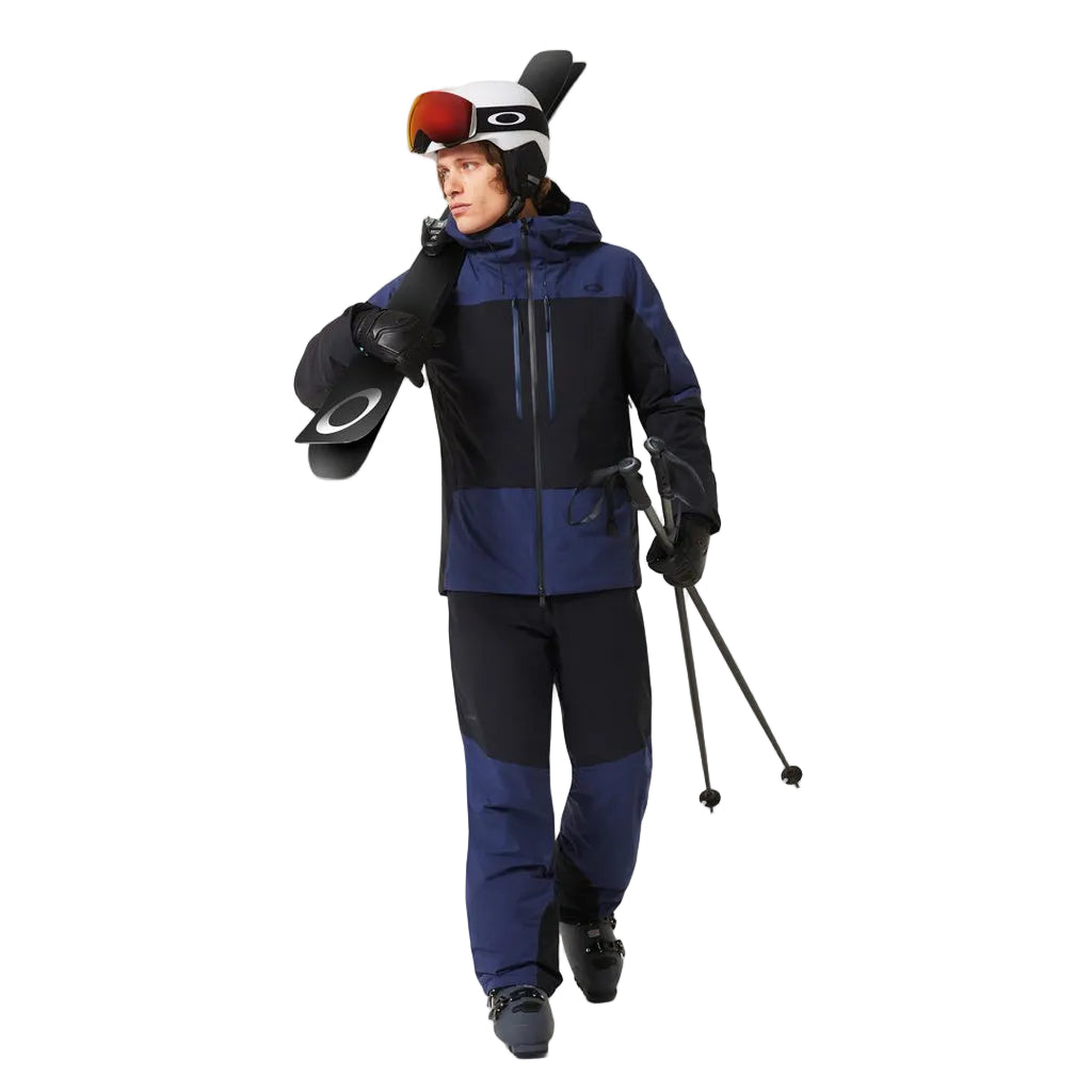 CanopyIns.ProJacket-Blue and black jacket with a brand logo on a white background