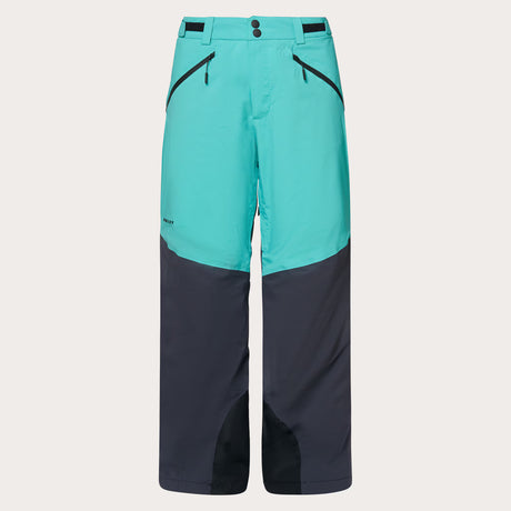 Canopy PRO Insulated Pant-Two-tone teal and navy pants on a light gray background