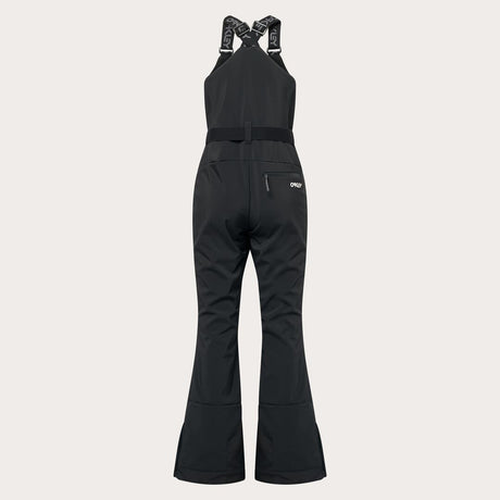 WTNPHarperSoftshellBib-Black ski jumpsuit with a belt on a light gray background