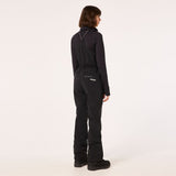 WTNPHarperSoftshellBib-Black ski jumpsuit with a belt on a light gray background