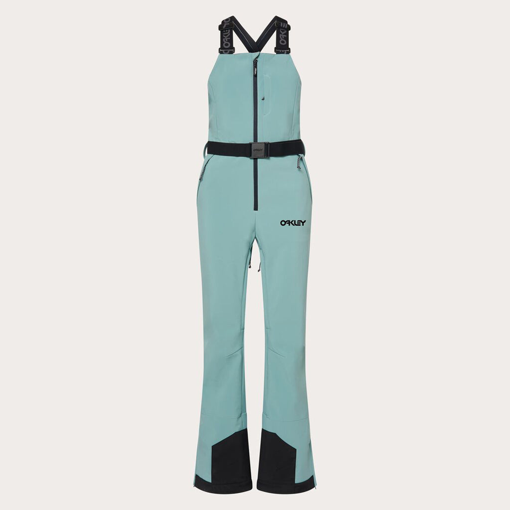 WTNPHarperSoftshellBib-Teal ski jumpsuit with a belt on a light gray background