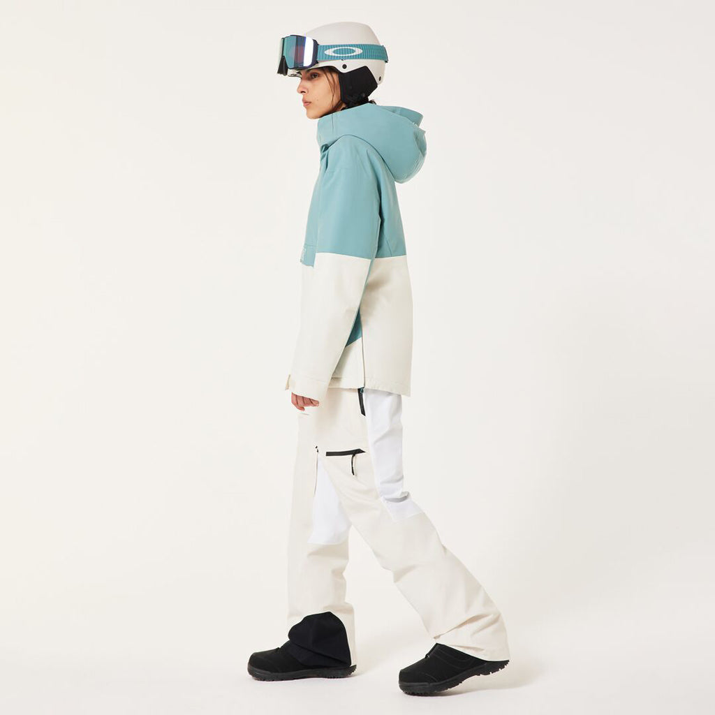 TNP TBT Insulated Anorak-Green and white jacket with Oakley logo on a light gray background