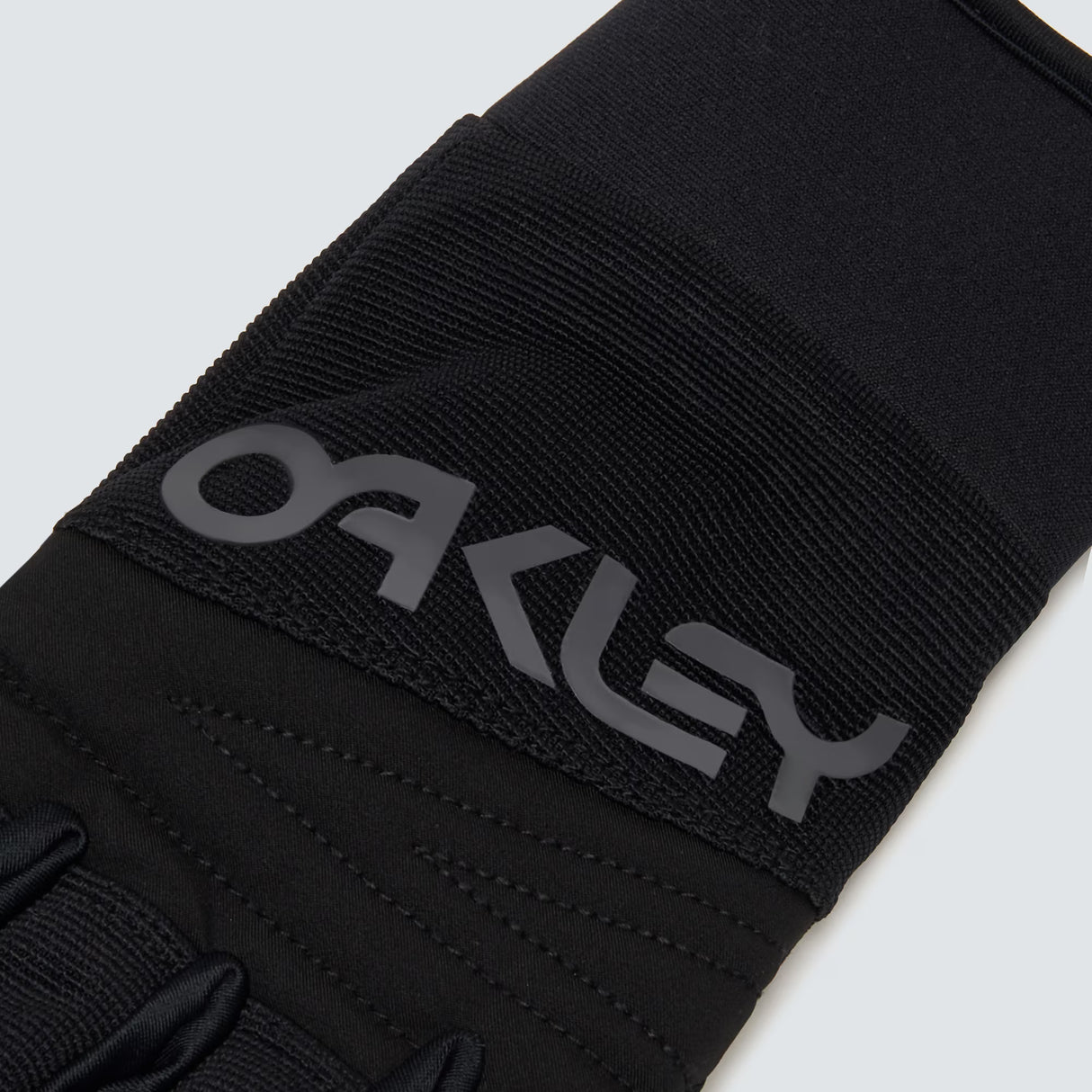 Factory Pilot Core Glove-Black gloves with brand logo on a light gray background